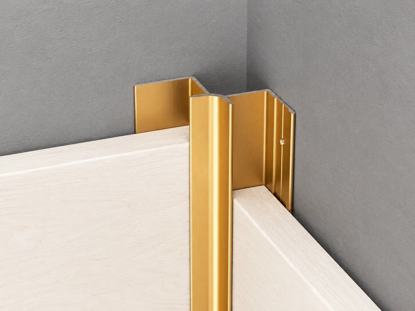 Aluminum corner trim installed between wall panels