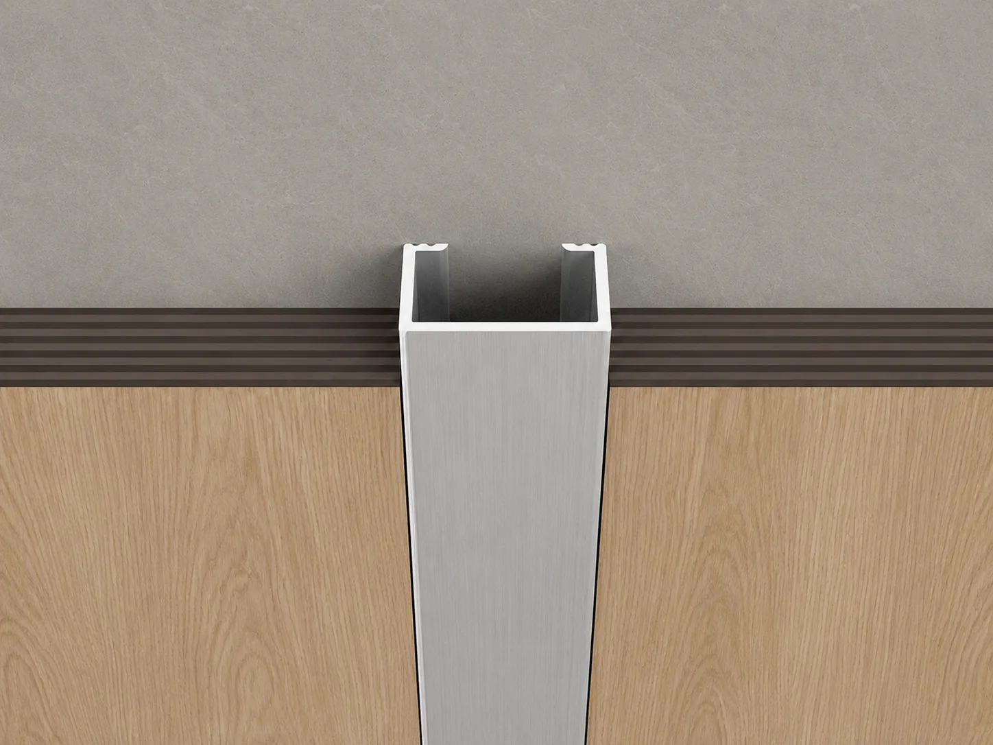 Silver aluminum divider trim installed between wood wall panels