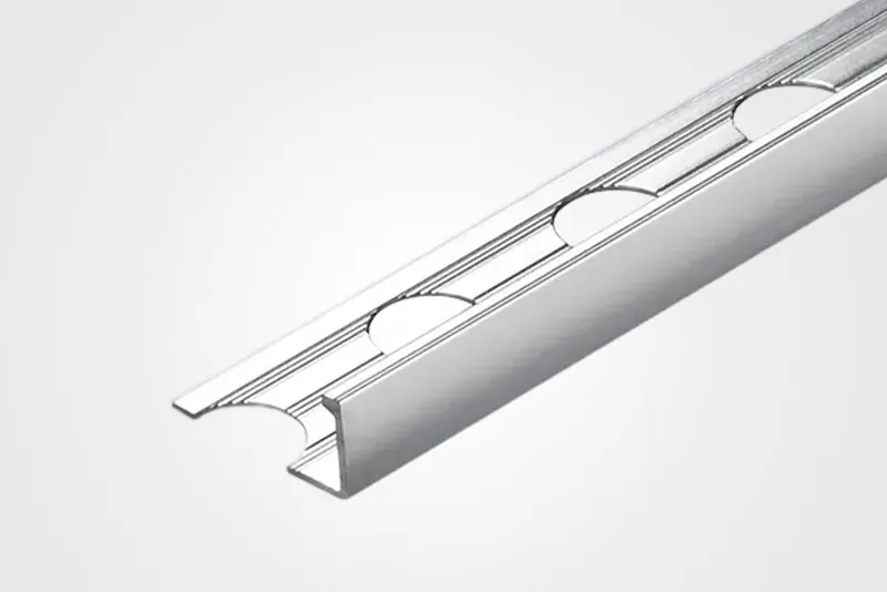 Silver L-shaped aluminum trim profile with a perforated fixing flange