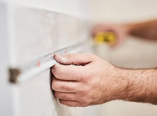 Measuring and marking tile edge trim before cutting