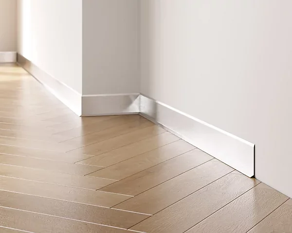 Minimal profile baseboard with a narrow visible face