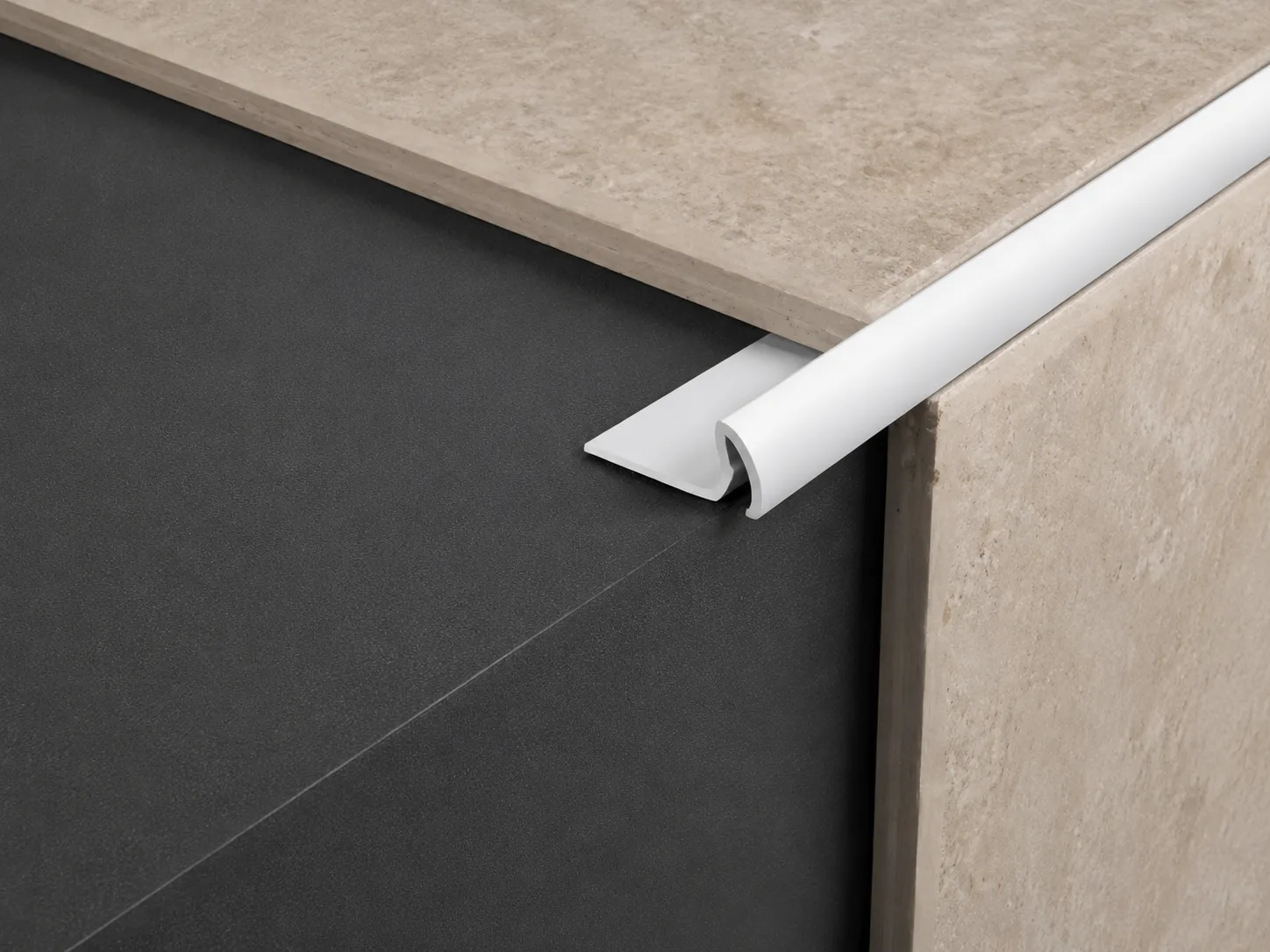 White PVC corner trim fitted over panel edges