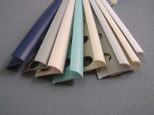 Assorted colored PVC tile edge trim profiles