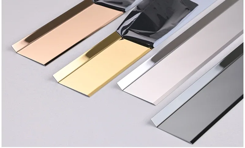Modern aluminum baseboard finish coordinated with flooring and interior metal details