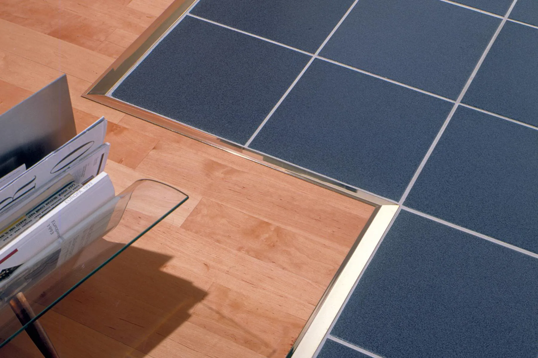 Grouting the tile joint and cleaning the finished metal tile edge trim surface