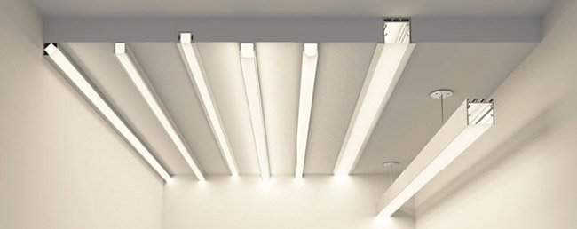 LED channel diffusers creating smooth linear light output in ceiling-mounted aluminum profiles