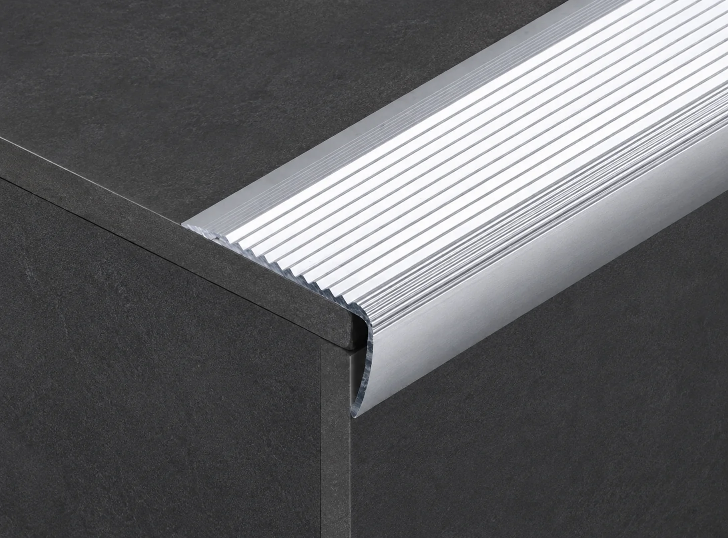Aluminum metal stair nosing profile with an anti-slip surface