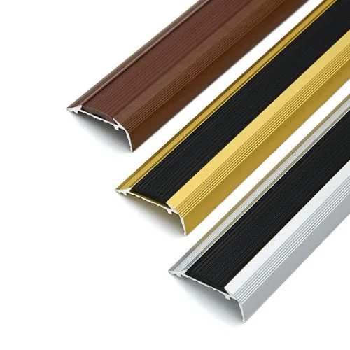 Metal stair nosing profile with a replaceable rubber insert