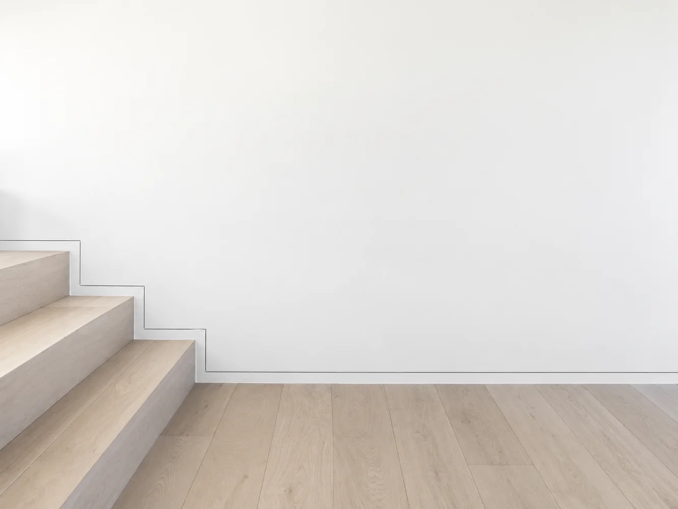 Coordinating contemporary skirting boards with tile trim and stair nosing