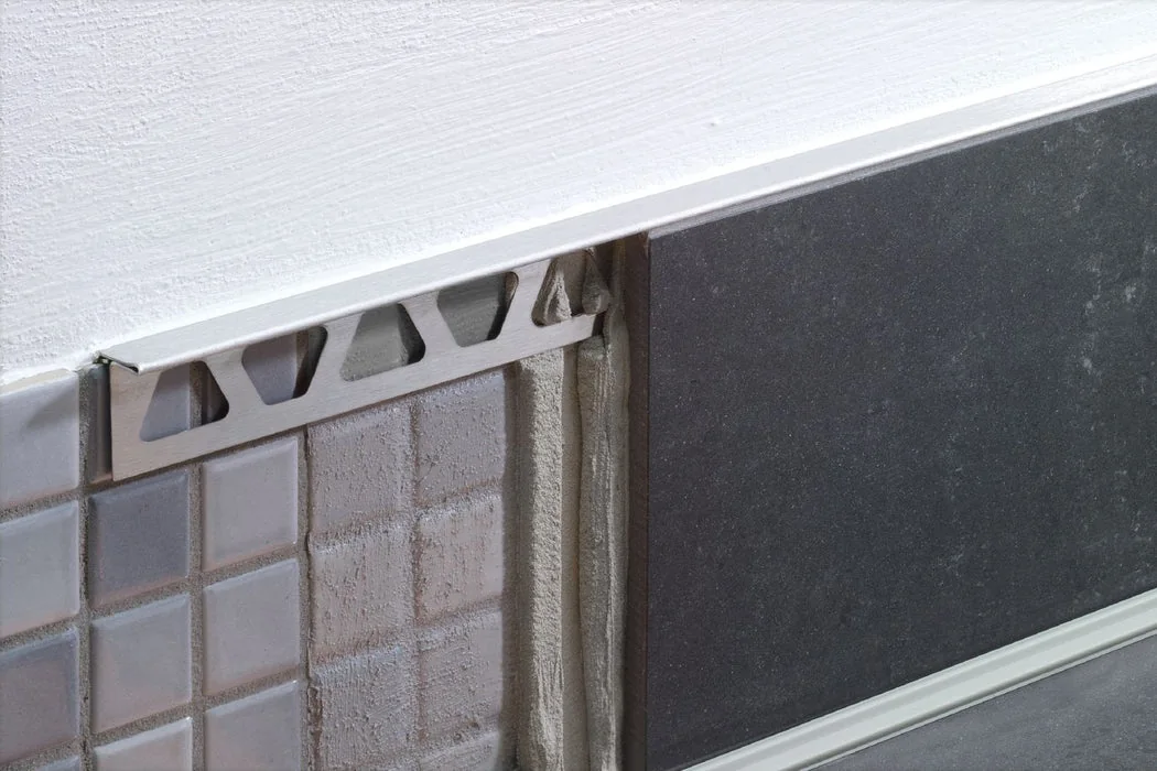 Tile Corner Trim covering and reinforcing an exposed tile edge