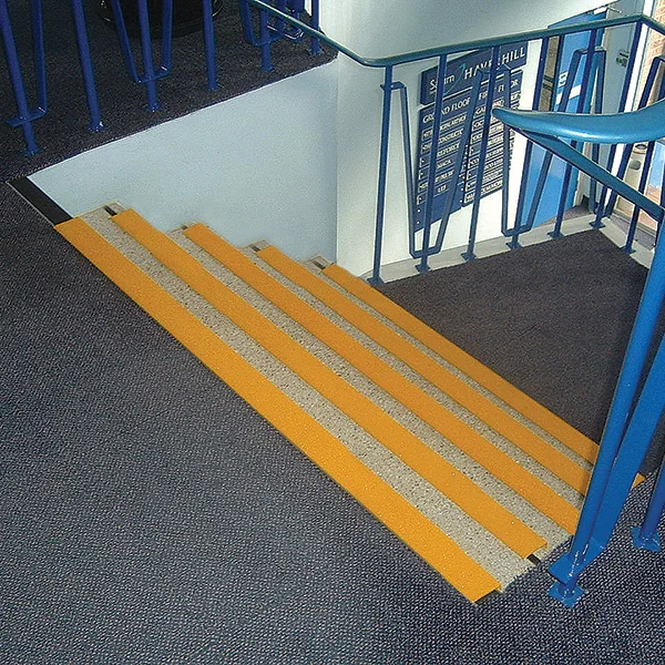 Metal Stair Nosing installed on a high-traffic public staircase