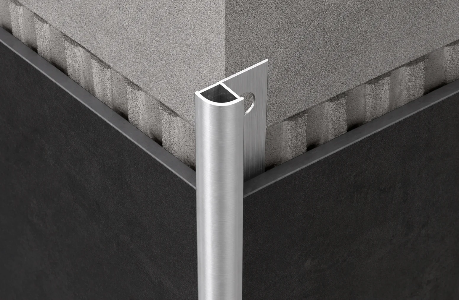 Rounded profile protecting the outside edge of tile