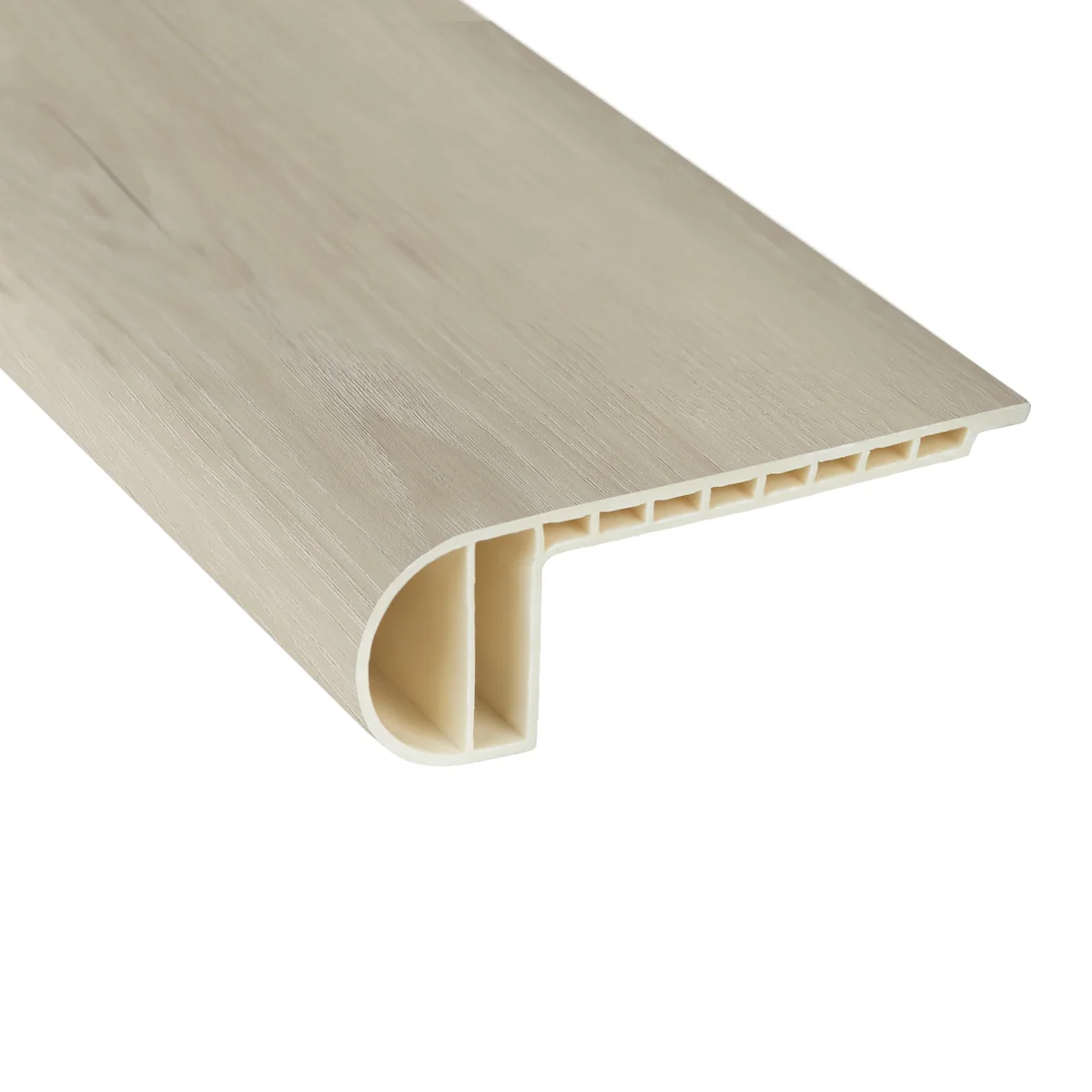 Vinyl stair nosing profile installed along a stair tread edge