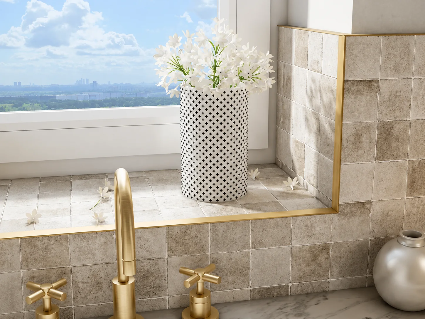 Brass backsplash tile trim with a decorative finish