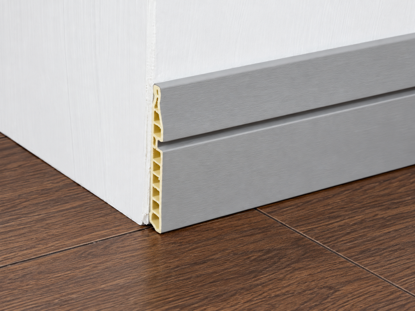 Chamfered baseboard with an angled top edge