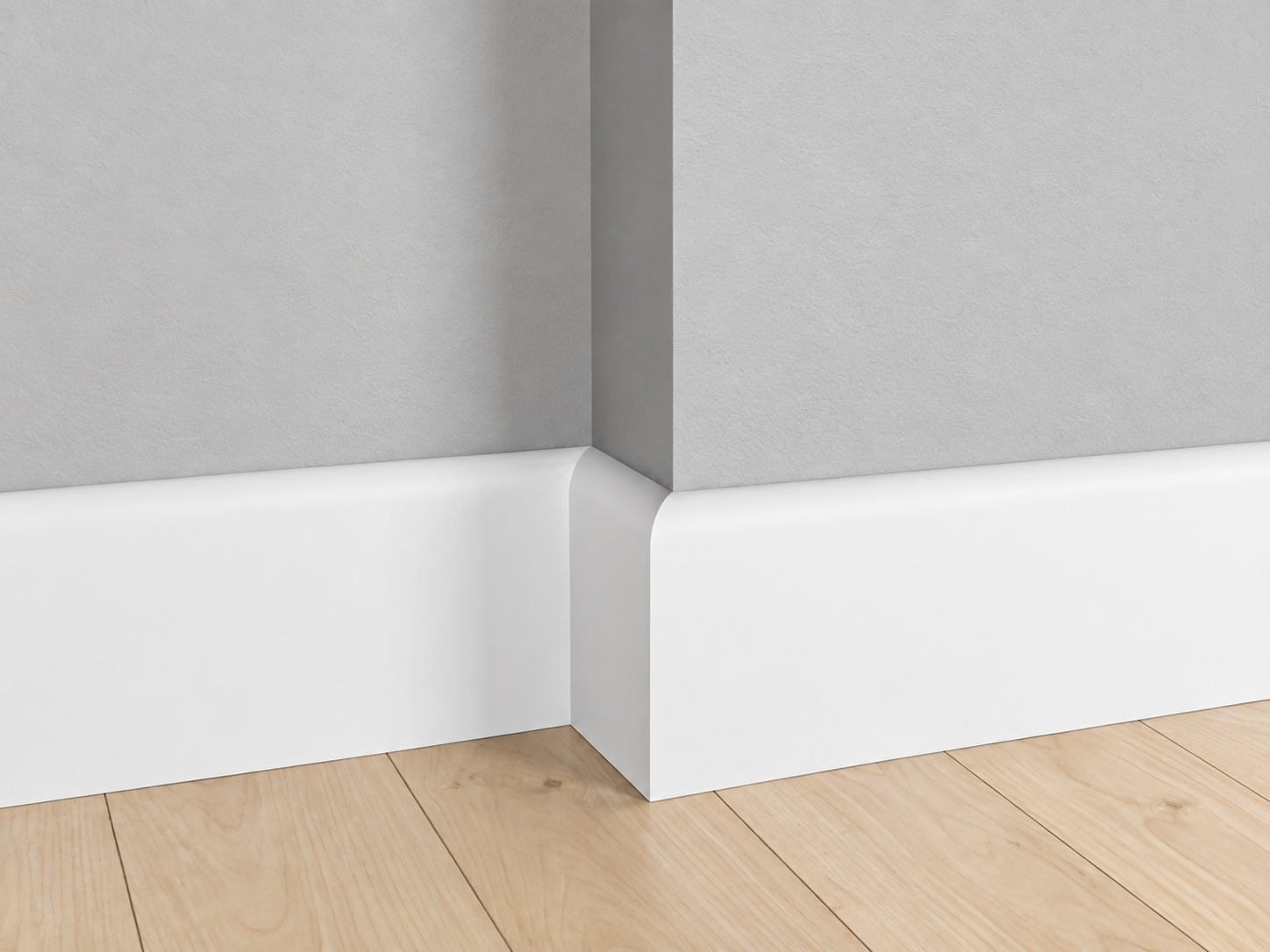 Rounded pencil-edge baseboard for a softer modern finish