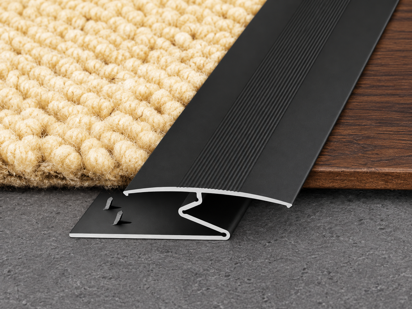 Z-bar carpet edge trim for carpet to hard floor transitions